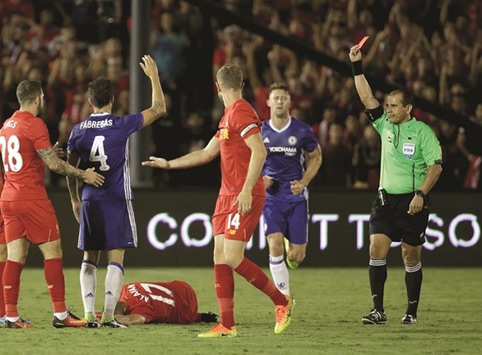 Chelseau2019s Cesc Fabregas #4 receives a red card after a hard challenge on Liverpoolu2019s Ragnar Klavan during the 2016 International Champions Cup at Rose Bowl.