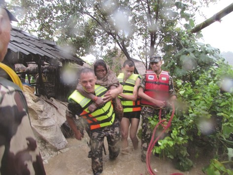Army personnel help flood victims in Kapilvastu, Nepal.