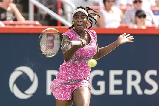 Venus Williams of the United States hits a return against Barbora Strycova of Czech Republic on day three of the Rogers Cup in Montreal on Wednesday. (AFP)