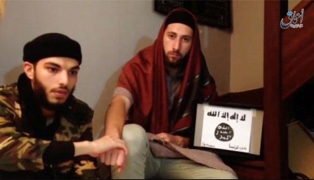 This still image taken from video shows Abdel Malik Petitjean and Adel Kermiche, the two church attackers.