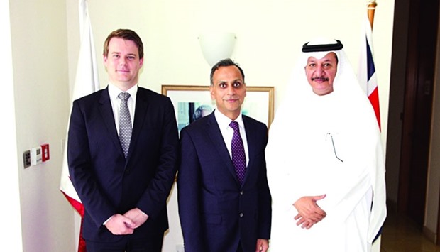Sheikh Abdullah bin Ali bin Jabor al-Thani and Mark Melvin with ambassador Ajay Sharma at the signing.
