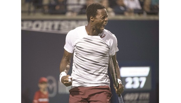 Gael Monfils of France reacts after breaking serve against Milos Raonic of Canada during the Rogers Cup in Toronto on Friday.
