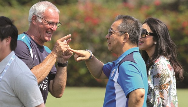 Leicester City coach Claudio Ranieri (left) jokes with clubu2019s Thai owner Vichai Srivaddhanaprabha during a training session in Carson, California, on Friday.