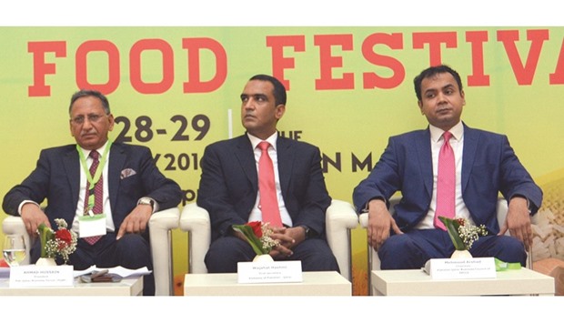 From left: Ahmad Hussain, president of Pakistan-Qatar Business Forum; Wajahat Hashmi, first secretary, embassy of Pakistan; and Mehmood Arshad, chairman of Pakistan-Qatar Business Council of FPCCI, at the event.
