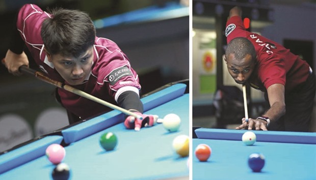Qatari players in action at the WPA World 9-ball Championship at the Al Arabi Sports Club in Doha yesterday.