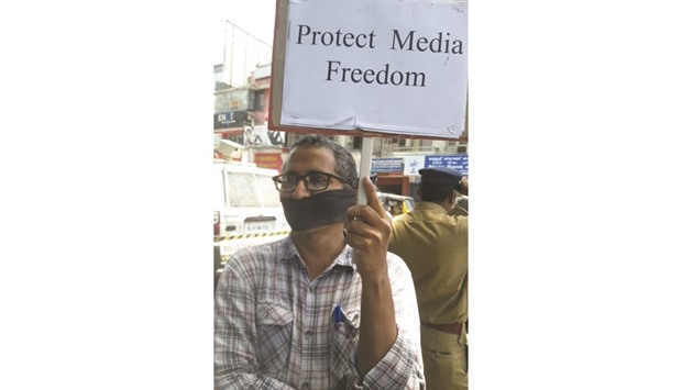 A journalist protests police action in Thiruvananthapuram yesterday.
