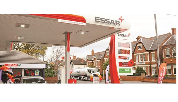 Essar Oilu2019s owners Ruias are willing to sell a maximum stake of about 30% of the company to Singapore-based commodities trader Trafigura. The billionaire brothers will use the proceeds from the sale to pay back bank loans, sources said.
