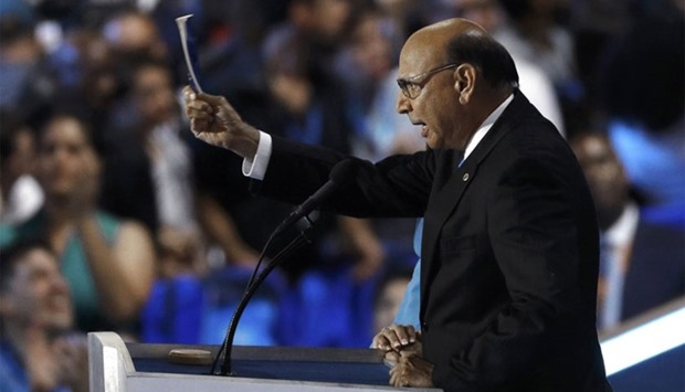 Khizr Khan, father of Army soldier Humayun Khan who died in Iraq, holds up the U.S. Constitution while addressing the Democratic National Convention in Philadelphia, Pennsylvania, US July 28, 2016