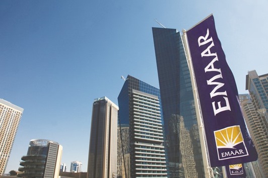 Flags of Emaar Properties fly in the Marina district of Dubai. Emaar the Economic City, builder of the King Abdullah Economic City, rose 2.6% in Saudi after the company reported a 58% jump in second-quarter net profit to 79mn riyals ($21.1mn).