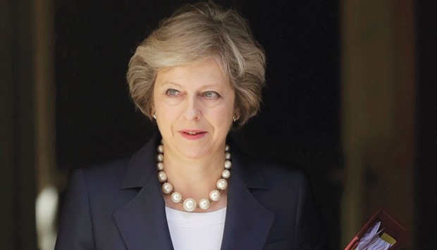 Prime Minister Theresa May: pledges to stick to the Tory manifesto pledge.