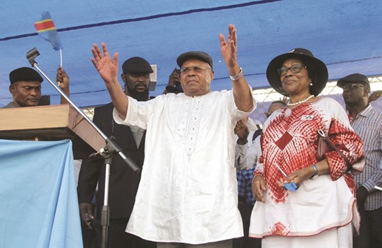 Etienne Tshisekedi, flanked by his wife Marthe, attending a political rally in Kinshasa yesterday.
