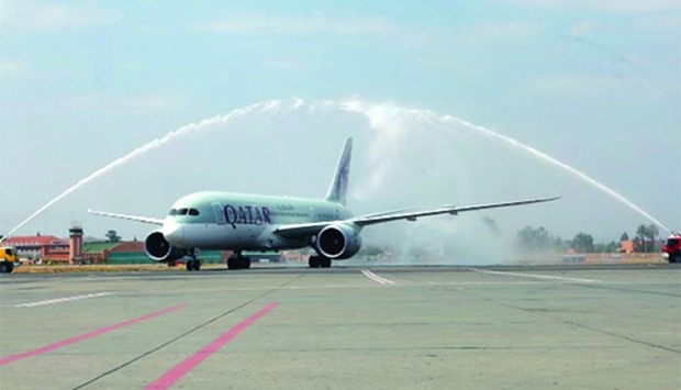 Flight QR1395 being welcomed with a water salute at Marrakech Menara Airport.