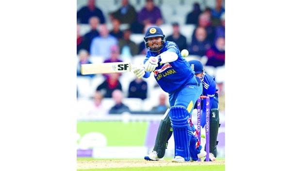 Sri Lankau2019s captain Angelo Mathews plays a shot during play in the fourth One Day International against England at The Oval cricket ground in London on June 29, 2016. (AFP)