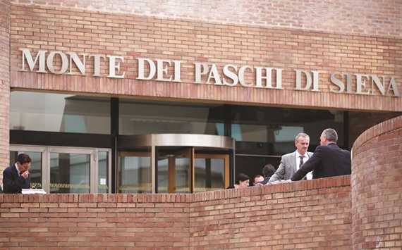 A sign outside the administrative offices of Banca Monte dei Paschi di Siena in Siena, Italy. The Italian lender used derivative transactions to mask losses and was later forced to restate its accounts.