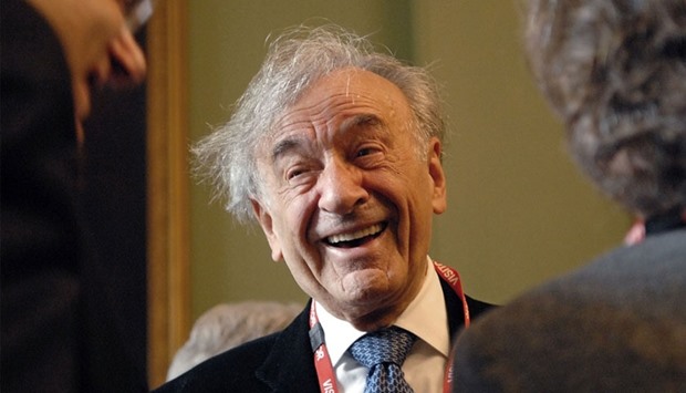 Elie Wiesel after being presented with an honorary knighthood by the British Foreign Secretary Margaret Beckett at the Foreign Office in London.  November 30, 2006, file photo.