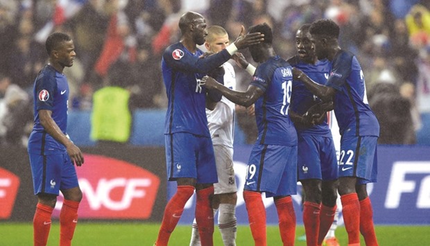 Franceu2019s players celebrating after the Euro 2016 quarter-final football match at the Stade de France in Saint-Denis, near Paris yesterday.