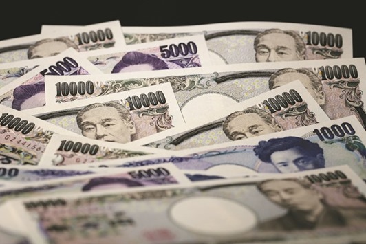 Japanese yen banknotes of various denominations are arranged for a photograph in Tokyo. What was the extreme bullish scenario among yen forecasters at the start of 2016 is now close to the base case - and even that may turn out to be too cautious.