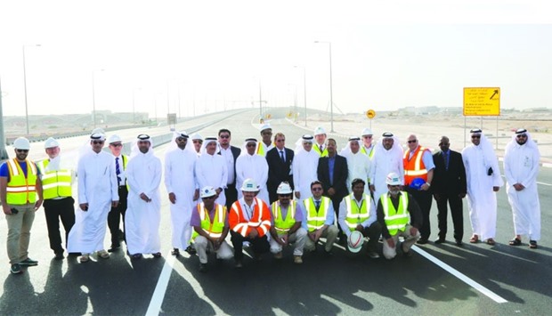 Ashghal and project officials at the opening of the new bridge extending from the F-Ring Road to Mesaimeer Road.
