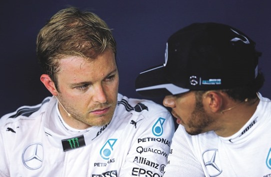 Mercedes teammates Nico Rosberg (left) and Lewis Hamilton. (Reuters)