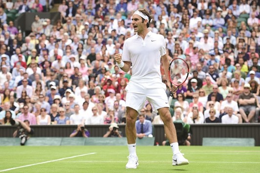 Switzerlandu2019s Roger Federer celebrates a point during his Wimbledon fourth round match against Steve Johnson of the US yesterday. (AFP)