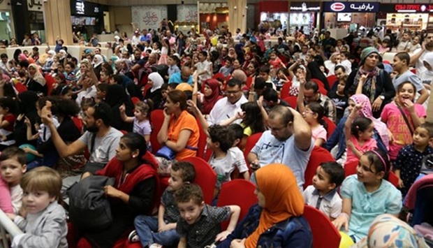 A large crowd enjoying the Eid al-Fitr show at Hyatt Plaza.