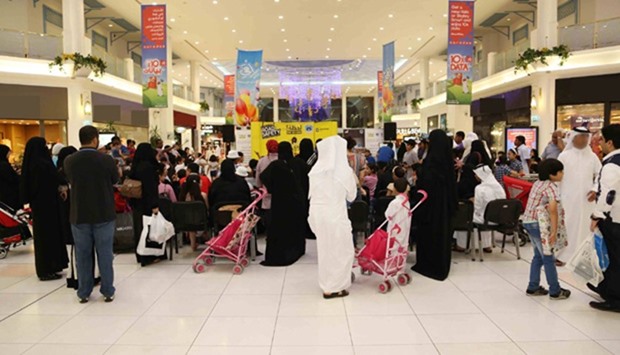 Residents throng malls and hypermarkets to buy gifts and goodies