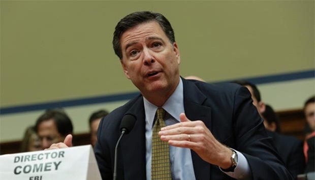 FBI Director James Comey testifies before a House Oversight and Government Reform Committee hearing on Capitol Hill in Washington, DC, on Thursday.