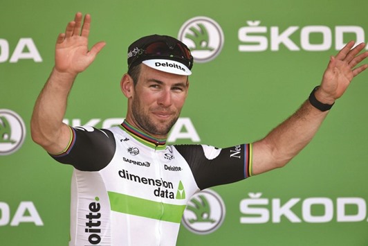 Great Britainu2019s Mark Cavendish celebrates on the podium after winning the 190,5 km sixth stage of the 103rd edition of the Tour de France cycling race yesterday. (AFP)