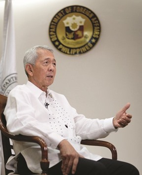 Foreign Secretary Perfecto Yasay gestures during an interview in Manila yesterday.