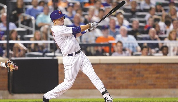 New York Mets first baseman Wilmer Flores hits a three run home run against the Washington Nationals during the fifth inning at Citi Field. PICTURE: USA TODAY Sports