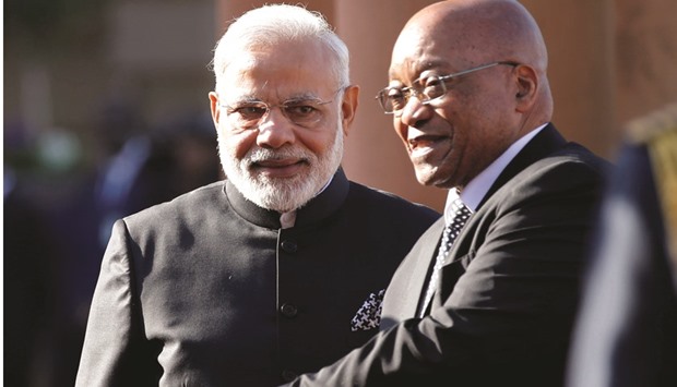 South Africau2019s President Jacob Zuma gestures next to Indiau2019s Prime Minister Narendra Modi (left) in Pretoria, South Africa on Friday. Zuma said that over 150 Indian companies are operating in South Africa and these firms are playing a u2018significant roleu2019 in the countryu2019s economy and job creation.