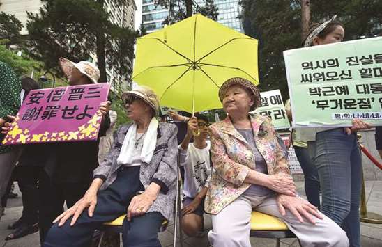A June 23, 2015 file photo of former u2018comfort womenu2019 Kim Bok-Dong (left) and Gil Won-Ok demonstrating outside the Japanese embassy in Seoul.