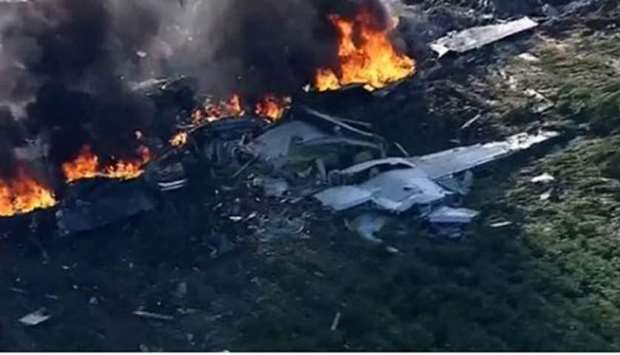The wreckage of a plane is engulfed in flames in LeFlore County. Picture: Twitter
