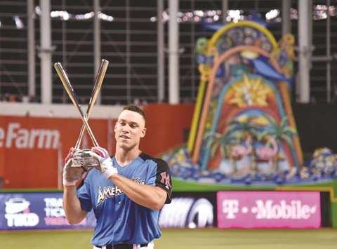 Aaron Judge of the New York Yankees celebrates with the trophy after winning the 2017 MLB Home Run Derby at Marlins Park in Miami. PICTURE: USA TODAY Sports