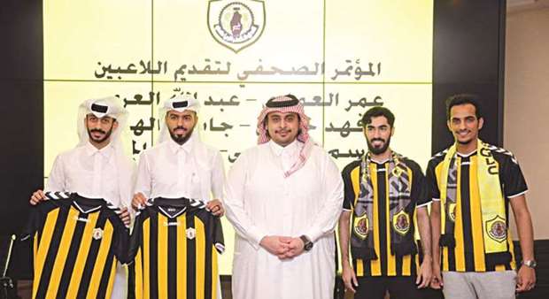 New Qatar SC players at the unveiling ceremony.