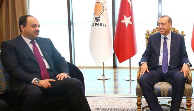 Erdogan (R) meeting with Qatar's Minister of Defense Khaled Al-Attiyah in Ankara