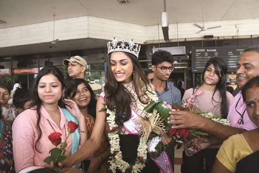 Wellwishers greet Priyanka Kumari, second runner-up Miss India 2017, at the Jay Prakash Narayan International Airport in Patna.