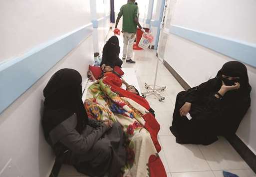 File photo shows young Yemenis, suspected of being infected with cholera, receiving treatment at a hospital in the capital Sanaa.