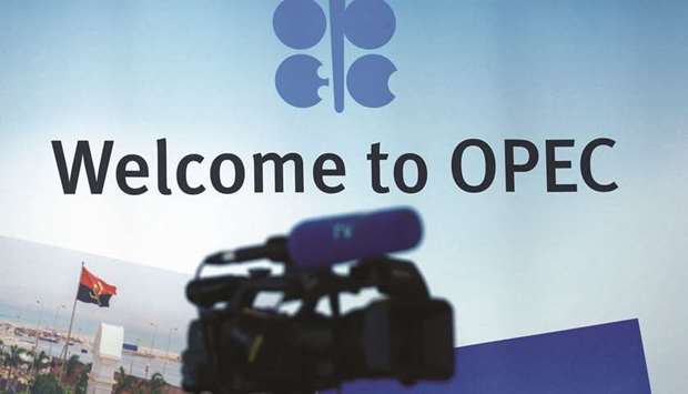 A TV camera is seen inside the Opec headquarters in Vienna. As crude sank below $50 a barrel u2013 less than half the price of two years ago u2013 market-watchers from  Goldman Sachs Group to former Opec officials said supply curbs imposed this year need to be intensified. That would be consistent with past behaviour, when  production cuts or increases often arrived in stages a few months apart.