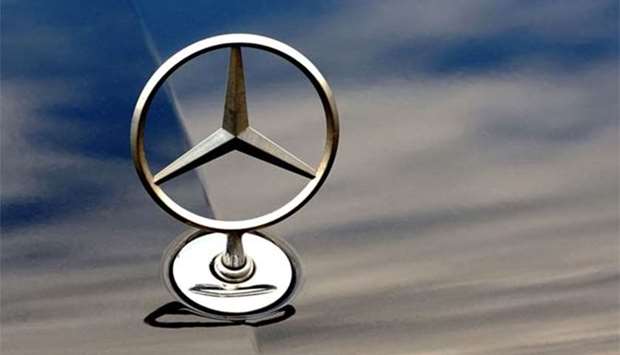 The logo of Mercedes Benz on a car of German auto giant Daimler AG is pictured in Bailleul, northwestern France.