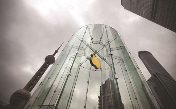 An Apple logo is seen in Pudong, the financial district of Shanghai. China has hundreds of millions of smartphone users and is a vital market for the firm, whose iPhones are wildly popular in the country.