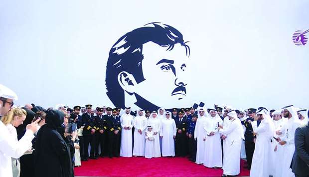 Qatar Airways senior officials, led by group chief executive Akbar al-Baker, unveiled the giant canvas of the iconic image of His Highness the Emir Sheikh Tamim bin Hamad al-Thani at the airlineu2019s corporate headquarters. PICTURE: Ram Chand