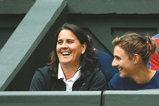Former tennis player Conchita Martinez sits in the family box to watch Garbine Muguruza play against Slovakiau2019s Magdalena Rybarikova during their womenu2019s singles semi-final match on the tenth day of the 2017 Wimbledon Championships at The All England Lawn Tennis Club in Wimbledon, southwest London, yesterday.