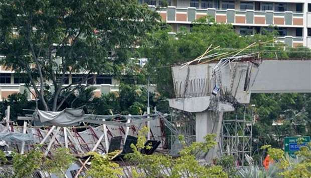The under-construction elevated highway in Singapore is seen after it collapsed on Friday.