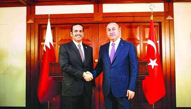 HE the Foreign Minister Sheikh Mohamed bin Abdulrahman al-Thani with his Turkish counterpart Mevlut Cavusoglu in Ankara.