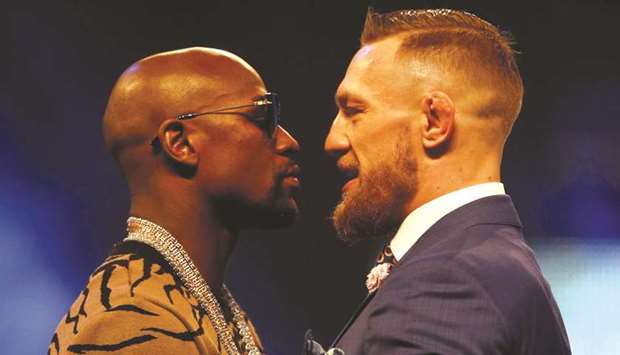 Floyd Mayweather and Conor McGregor during their press conference in London. (Reuters)