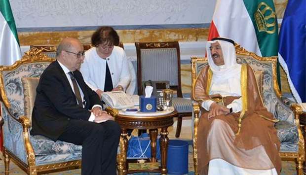 The Emir of Kuwait, Sheikh Sabah al-Ahmad al-Sabah, meeting with French Foreign Minister Jean-Yves Le Drian at Bayan Palace in Kuwait City on Sunday.