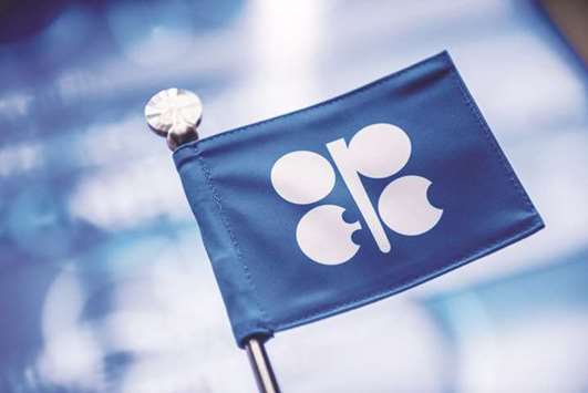 An Opec branded flag sits on a table ahead of its meeting in Vienna, Austria (file). Opec and allied producers are being partially offset by a rebound in supply from Libya and Nigeria and by US shale output.