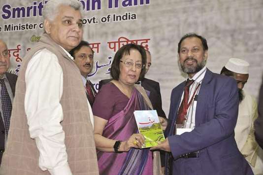 Shahabuddin Ahmad, right, with Dr Najma Heptulla, Governor of Manipur in India, and Dr Irteza Karim, Director of NCPUL India.