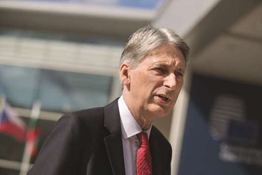 UK Chancellor of the Exchequer Philip Hammond arrives for a meeting in Luxembourg on June 16, 2017. Hammondu2019s latest comments underscore the continued splits over Brexit and other policies in Mayu2019s government, which has been weakened since it lost its majority in Juneu2019s general election.